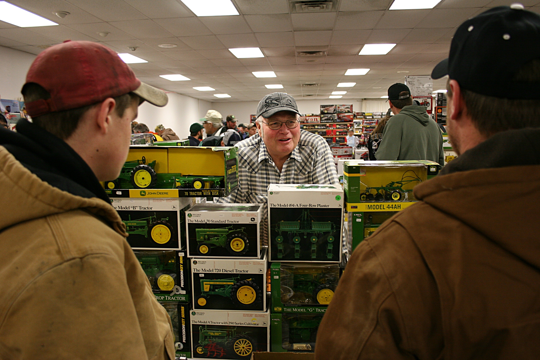 Vending John Deere toy tractors.