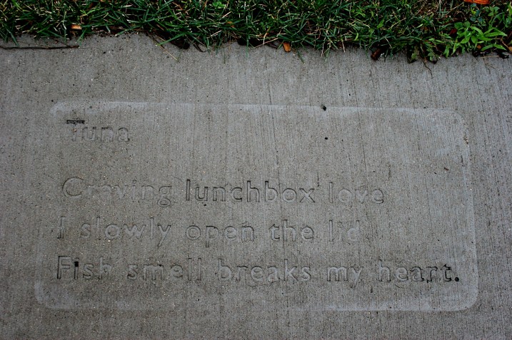 A poem by Mankato resident Yvonne Cariveau imprinted  in the sidewalk at Riverfront Park, Mankato, as part of the WordWalk project.