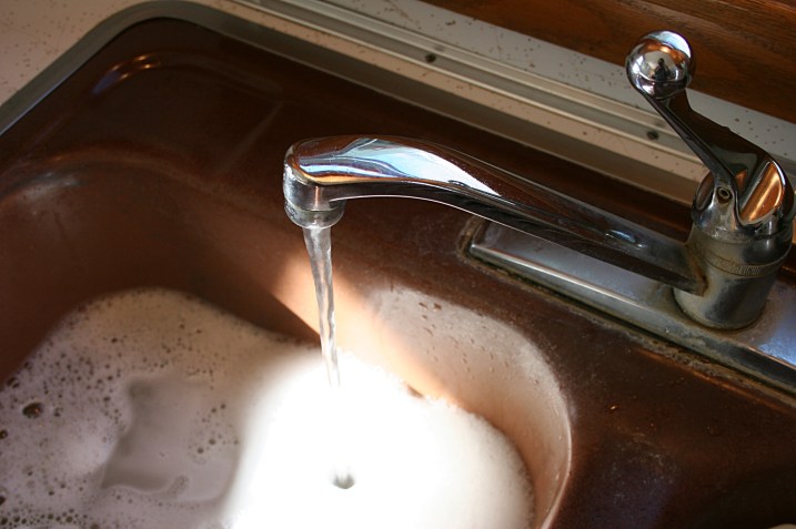 I hate this brown sink. But, hey, at least I have hot water again flowing from my leaky faucet.