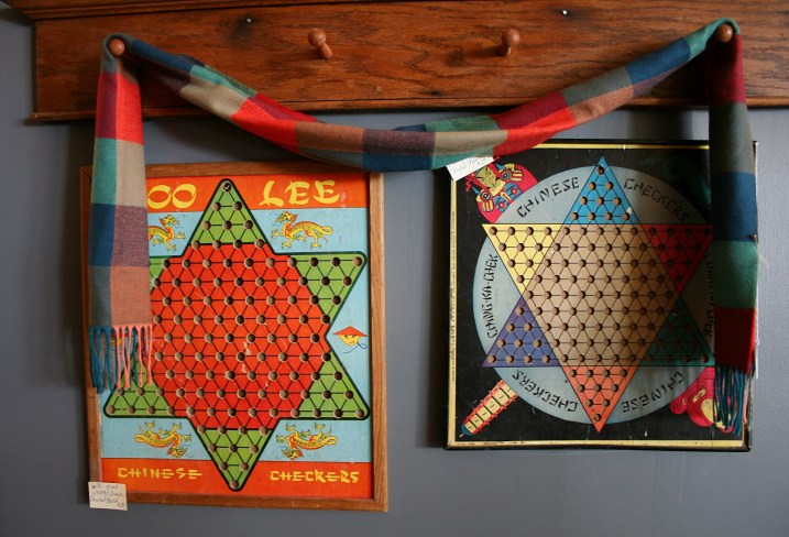 I own a vintage Chinese checkers board similar to these, found at a garage sale 30 years ago.