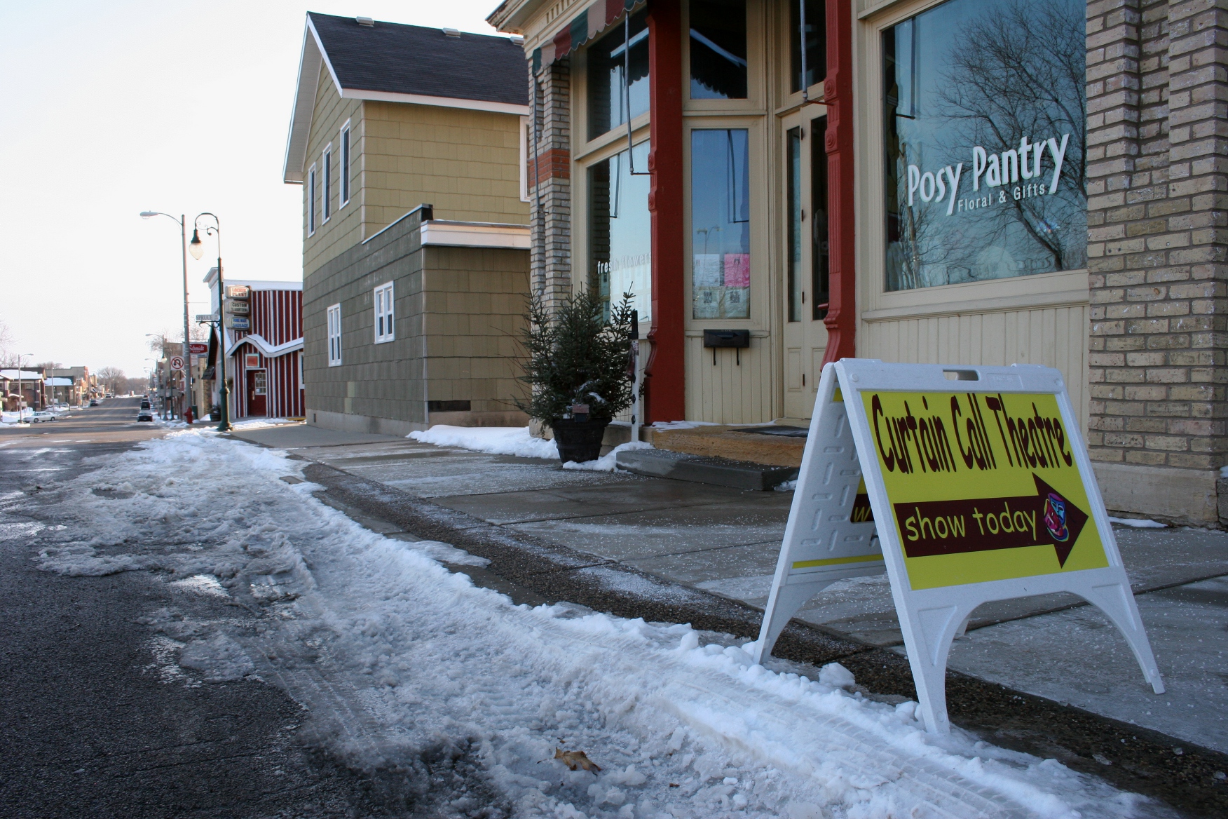 A sign outside Hilltop Hall directs guests to the Curtain Call Theatre performance of "On Golden Pond." The area theatrical group also performs in neighboring New Prague.