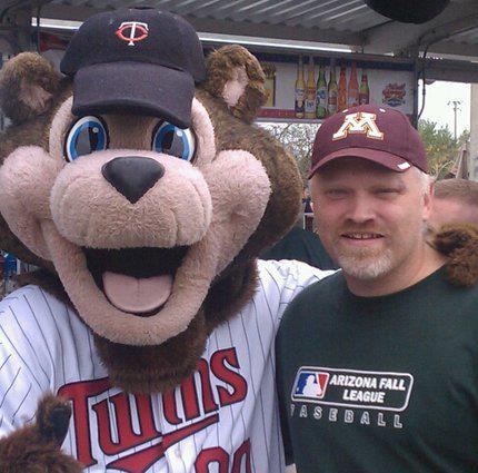 Terry Borning with TC Bear, the Twins mascot.