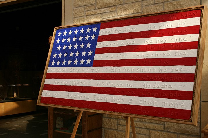 Gordon M. Coons also created this 1862 U.S. flag which features the names of the 38 Dakota who were executed during a mass hanging in Mankato. "...the 38 Dakota are woven into the history of the U.S. and appear to be woven into the flag," information posted with the display at the Traverse des Sioux Treaty Center states.