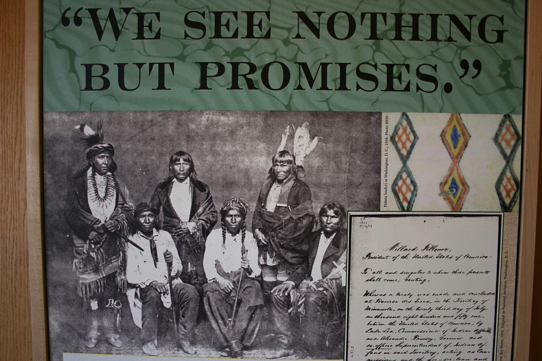 A photo panel at the Traverse des Sioux Treaty Center in St. Peter shows Dakota leaders photographed in Washington D.C. in 1858. The photo is from the Minnesota Historical Society.