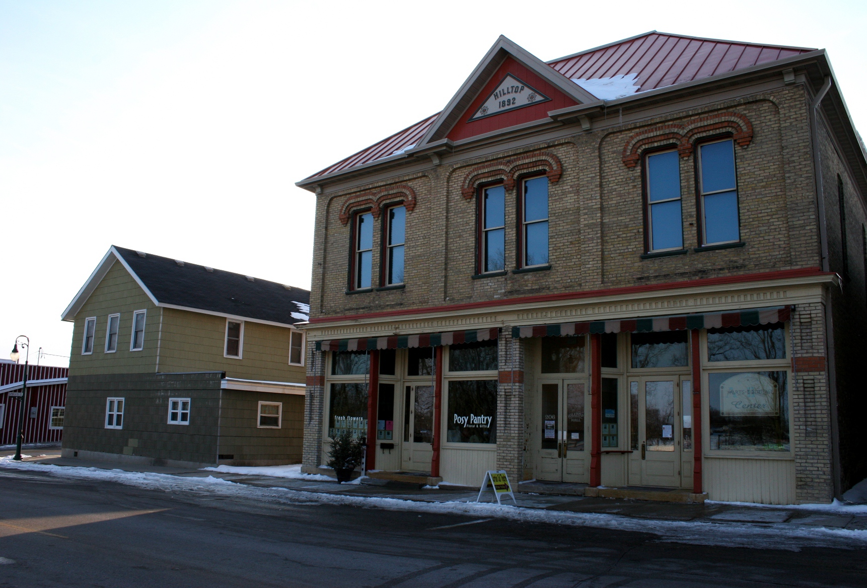 If you look closely, you can see the veterans' tributes in the lower windows of Hilltop Hall.