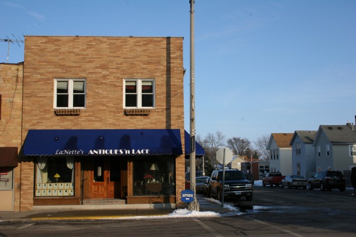 More personal memorials grace the windows of La Nette's Antiques.