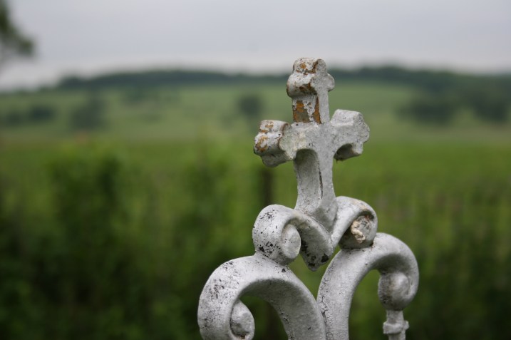 A cross in Trebon Cemetery, 10 miles northwest of Faribault in Shieldsville Township.