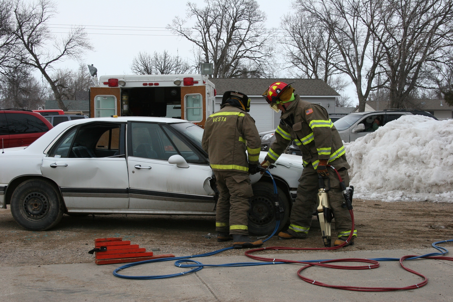 Peeling away doors with the new Jaws of Life.