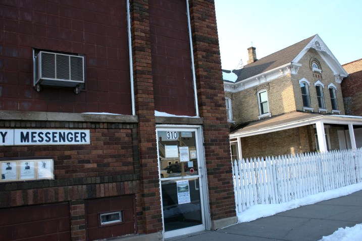 I don't expect I'll get inside this vintage 1800s house tucked between businesses on First Street, but I could try. That's the office of the local newspaper, The Montgomery Messenger, on the left.