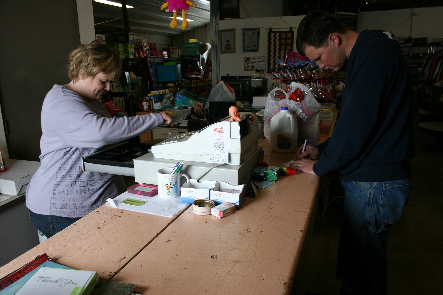 Jason Kramer stops in to buy a few grocery items from Bernadette.