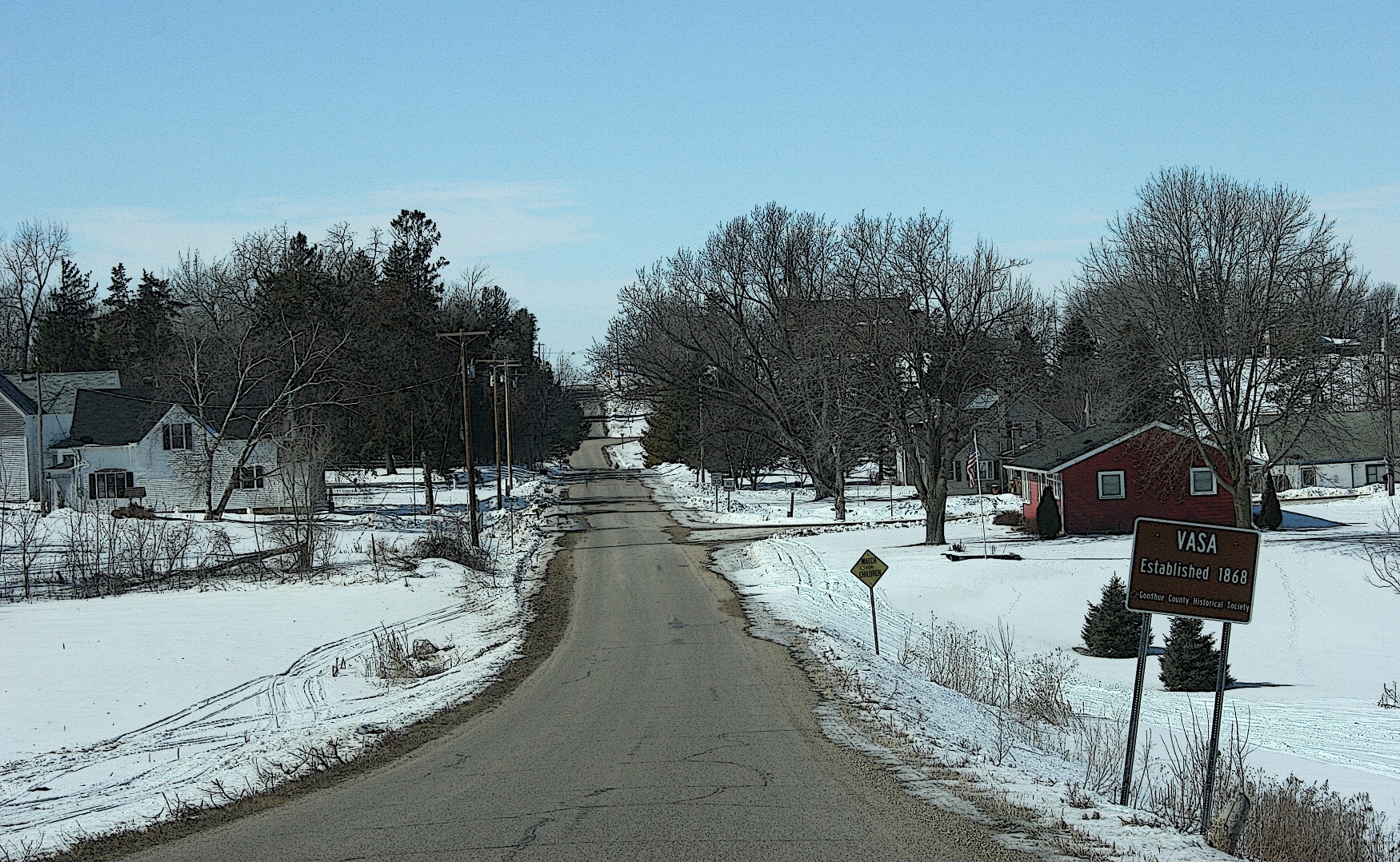 Driving into Vasa, established in 1868, according to a the historical marker, right.