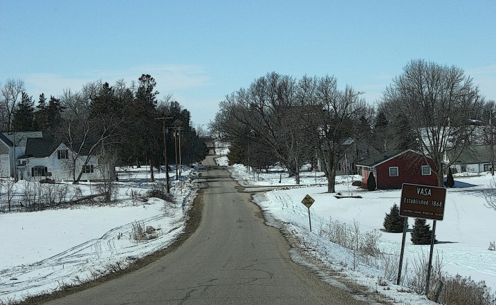 Driving into Vasa, established in 1868, according to a the historical marker, right.