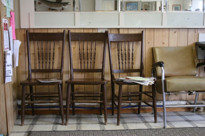 Vintage chairs await customers.