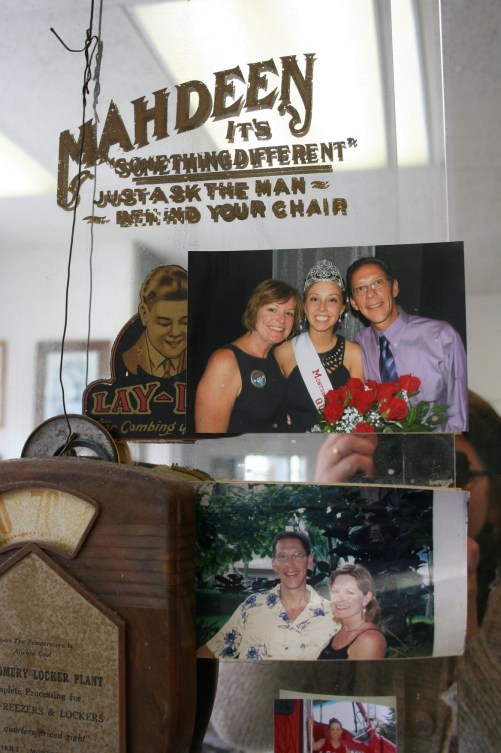 Family photos at Steve's work station.