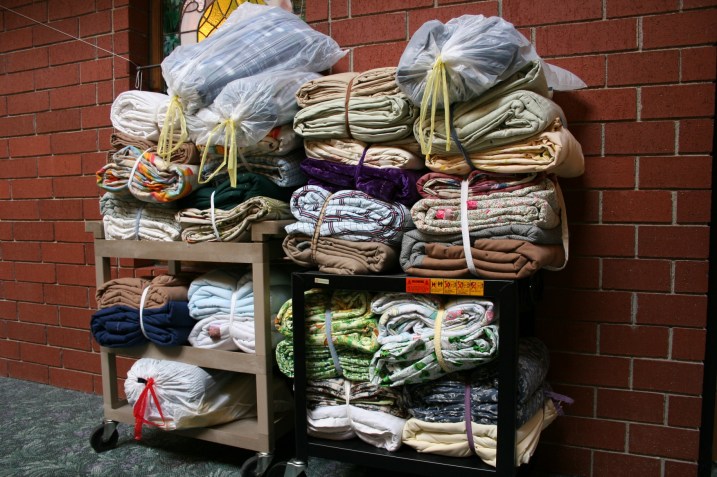The Trinity Quilt Makers gifted the group with this stash of quilts.