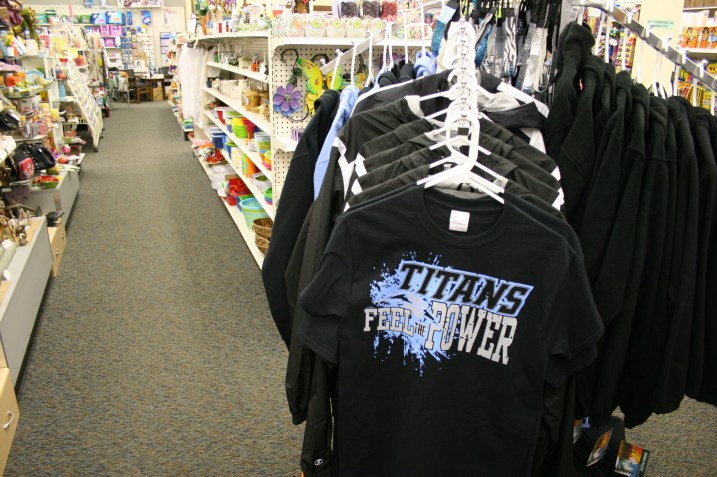 The drugstore sells Titans apparel for the local school.