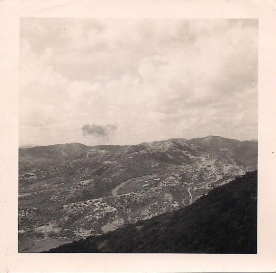 This photo, pulled from the shoebox which holds my dad's military photos, is simply labeled "front line." That would be "front line" as in Korea, where my soldier father fought.