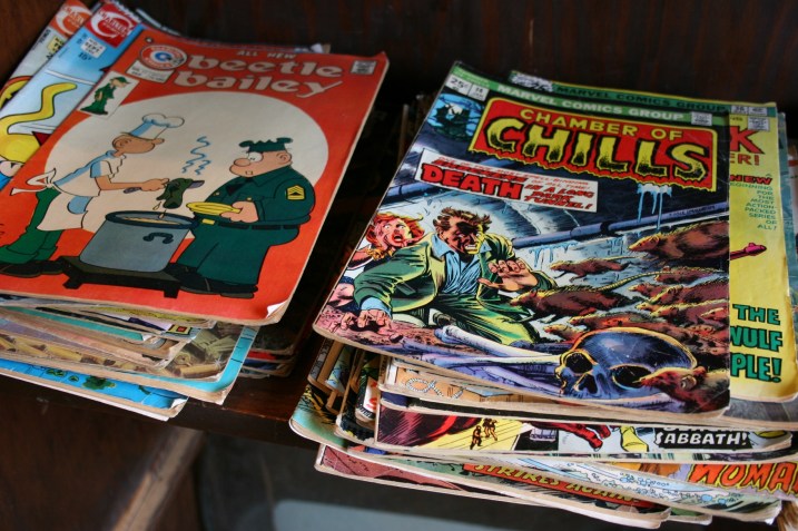Colorful comic books found in a tiny back room of the store.