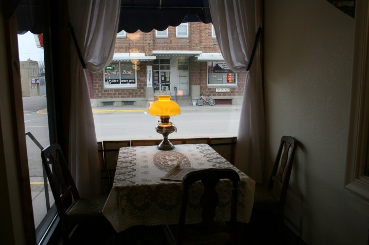 Shoppers can settle in and watch activity along First Street in this cozy corner of LaNette's shop.