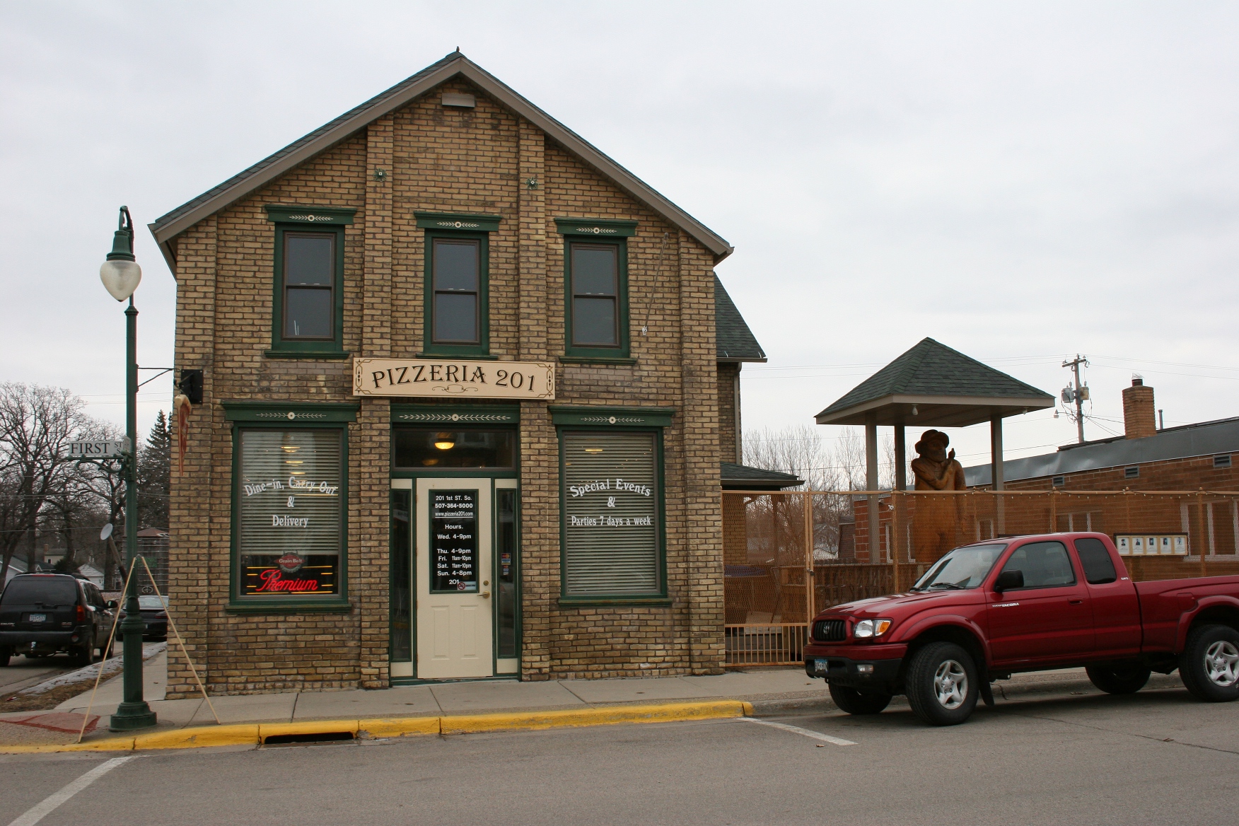 That's the carving of Big Honza Giganticzech, to the right of Pizzeria 201.