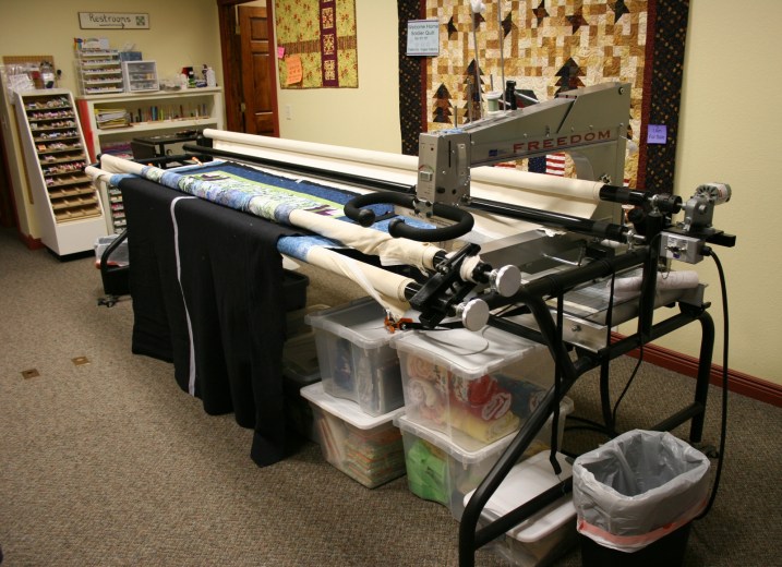 Michelle uses this long-arm sewing machine to quilt at the shop. Quilters can also pay to use the machine.