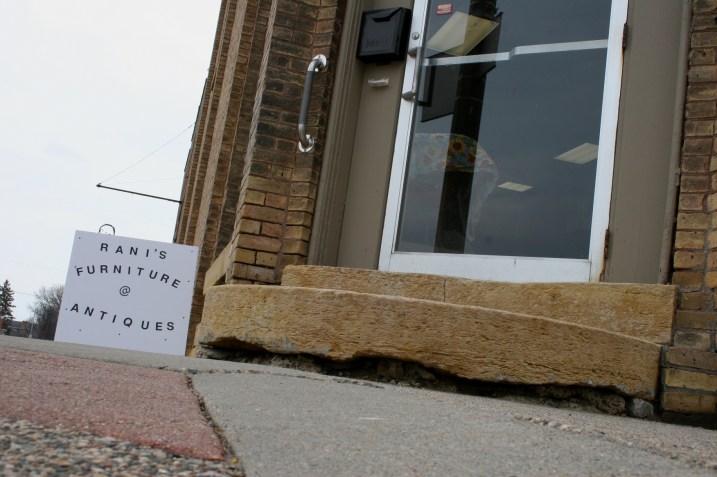 The stone block steps leading into Rani's.