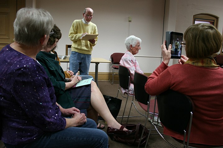 Audience members read their poetry prior to Boss' reading. Some audience members, like me, were honored at a "Meet and Greet the Poets" reception earlier for those published in Poetic Strokes 2013, a regional anthology of poetry published by Southeastern Libraries Cooperating.
