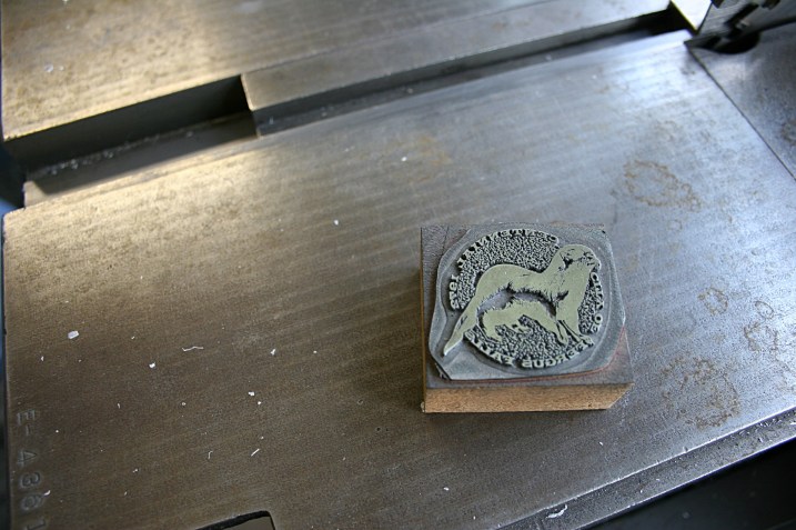 While digging through all that vintage art, we found this City of Fergus Falls Centennial Seal of an otter. The city is located in Otter Tail County.