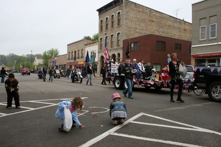 Kids scramble for candy.