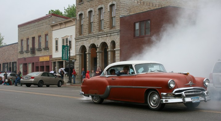 This vintage car exited the parade route after about two blocks. My husband automotive machinist diagnosed a blown head gasket.