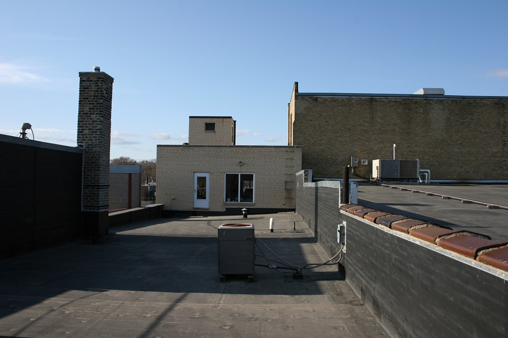 Atop the roof and looking toward the door into the Lundeen Company.