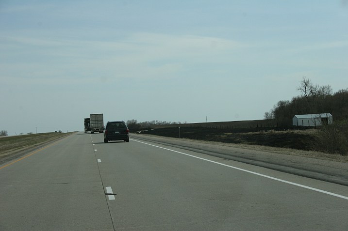 This photo shows a section of the road ditch burned Friday morning along I-94 near Rothsay and photographed several hours later.