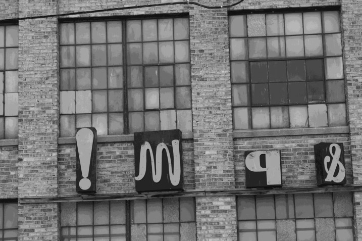 Signage on the exterior of the Hamilton Wood Type Museum.