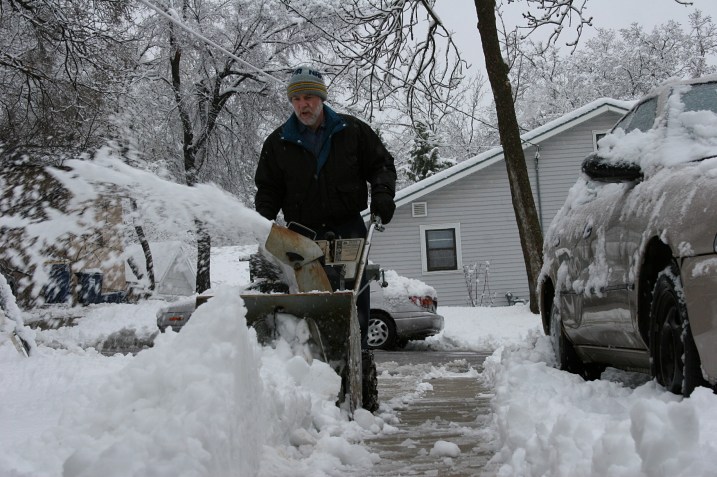 My husband blowing out our driveway.
