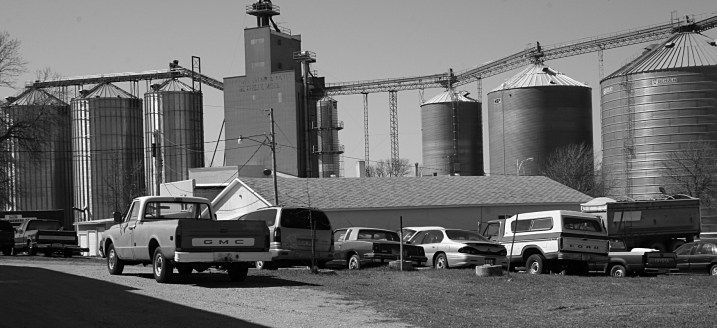 Vehicles parked behind the body shop.