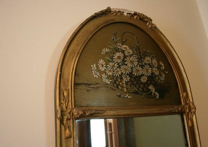 One of my all-time favorite finds is this oblong mirror (only a portion shown here because mirrors are challenging to photograph without getting yourself in the pic)