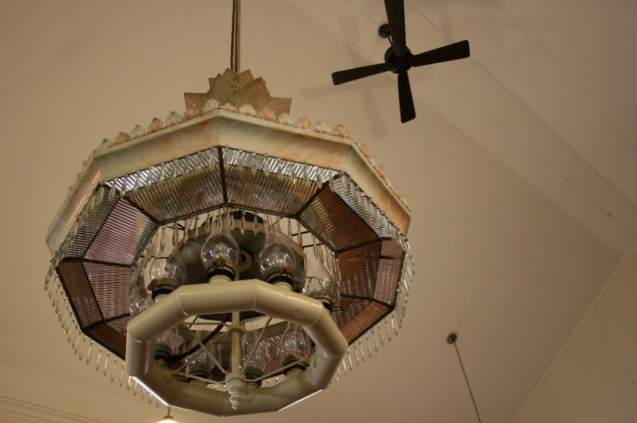 Suspended from the ceiling is this incredible historic light fixture.