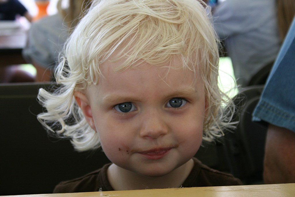 Ava, 2 1/2, lives in the Twin Cities. Her grandparents, who live near Dundas, brought her to the farm because she loves animals.