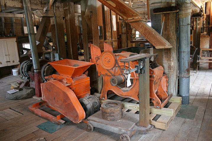 The old feed mill is stocked with lots of vintage grinding equipment.