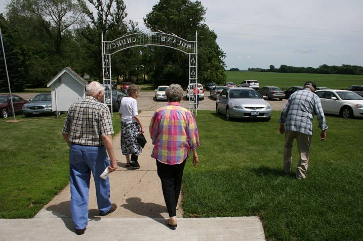 Diners exit the church.