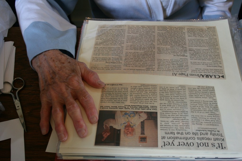 One of my favorite images is this one of volunteer Helen Newman's hand. She was cutting and taping info into the 2005 sesquicentennial book lying on the desk.