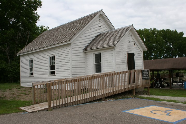 The District #54 country school, built in 1870, was moved into Morristown several years ago to a site next to the old mill along the banks of the Cannon River.