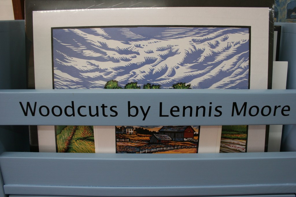 If I had excess discretionary funds, I would have purchased the woodcut art of Lennis Moore sold at Eckheart Gallery.