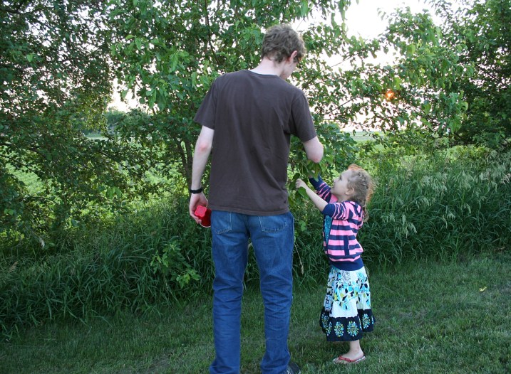 I love this photo of my 19-year-old son, Caleb, picking berries with Ari.