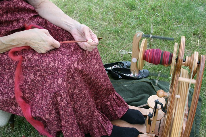 Craft demonstrations, like spinning, are part of the festivities.