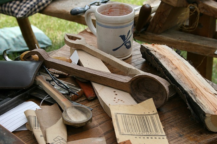 Tools and materials for crafting beautiful wooden spoons.