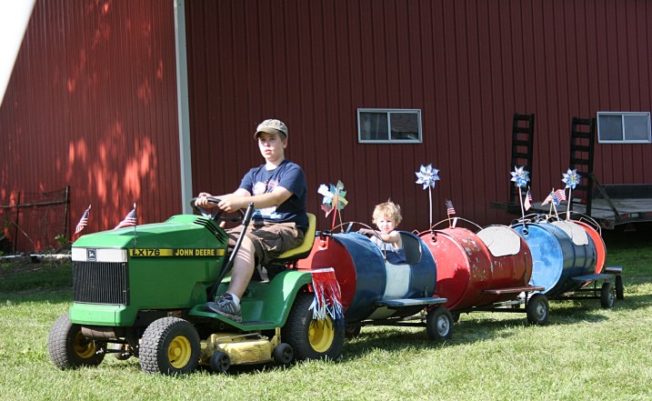 Riding the old-fashioned barrel train.