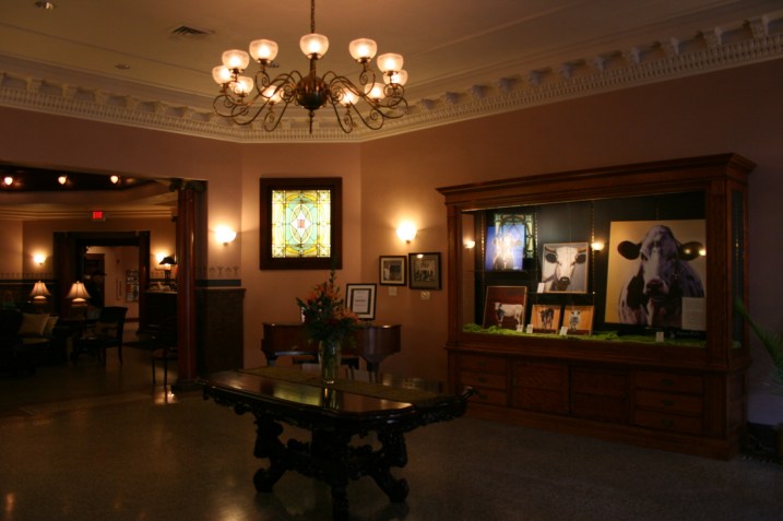 The entry features this luxurious lobby and current cow art.