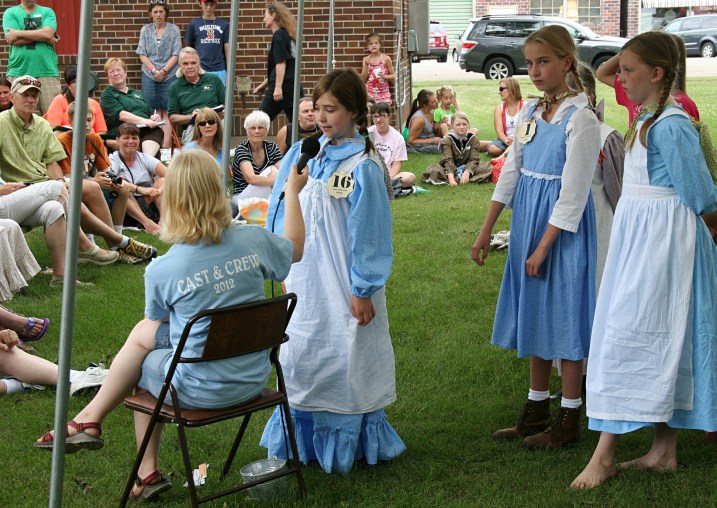 Each contestant was asked where she had traveled from, whether she'd visited other "Laura" sites and whether she'd attended the "Wilder Pageant" before drawing a question from a lunch pail.