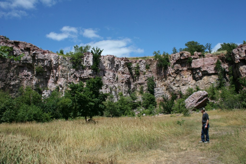 My husband inside the portion of the park where rock was once quarried.